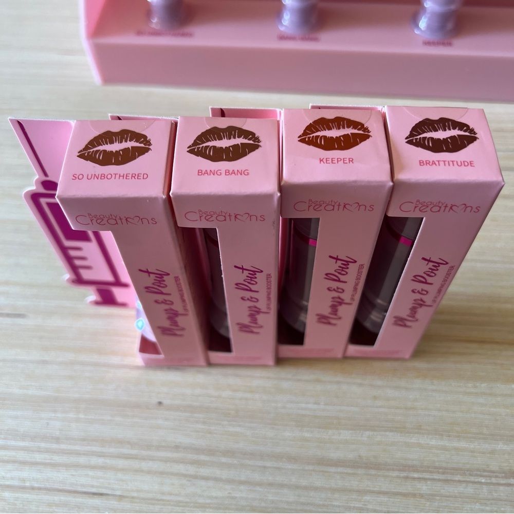 (4 pack) -Beauty Creations Plump & Plout
Plumping Booster Gloss SET